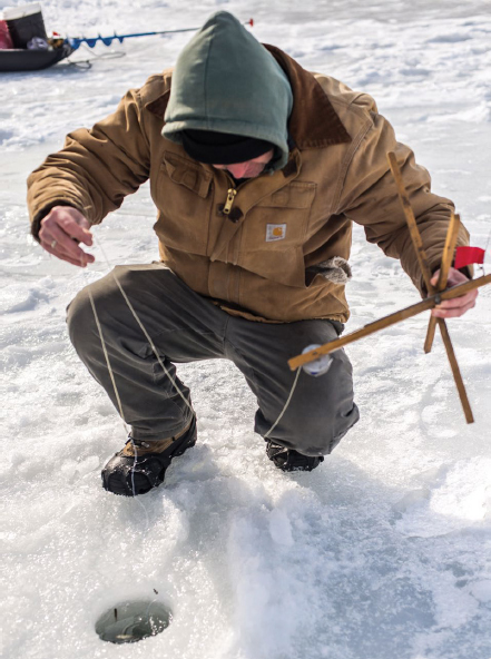 Mark Crowther ice fishes without shelter no matter the temperature.