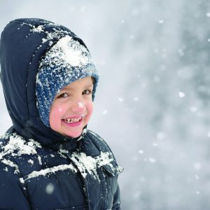 Happy Child in Wintertime
