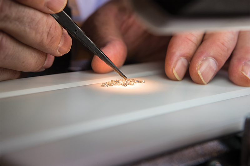 inspecting gemstones at mcwayne jewelers